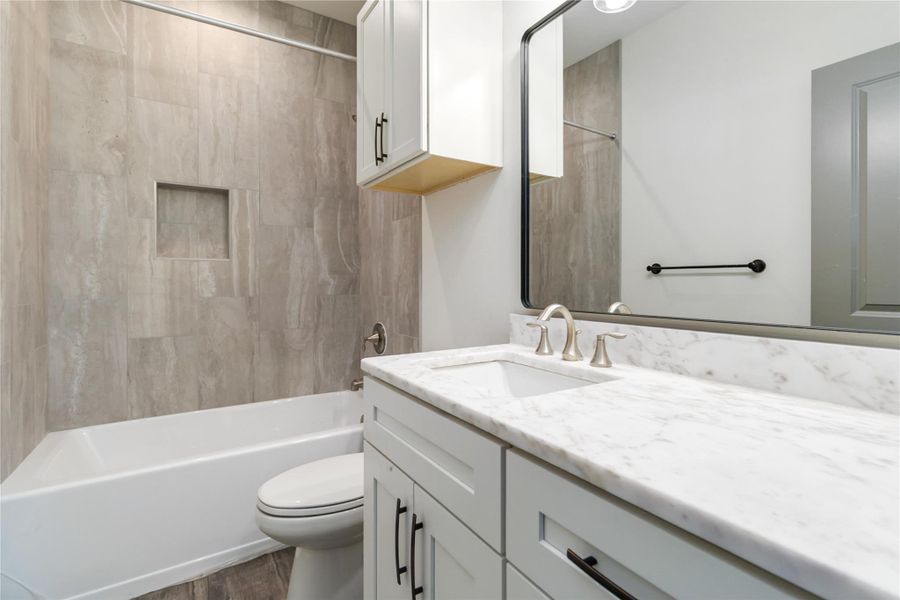 Upstairs secondary full bath