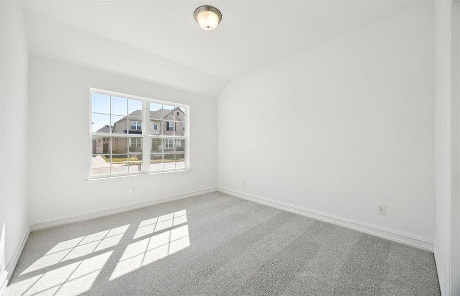 Spacious secondary bedroom with large windows Spacious secondary bedroom with large windows