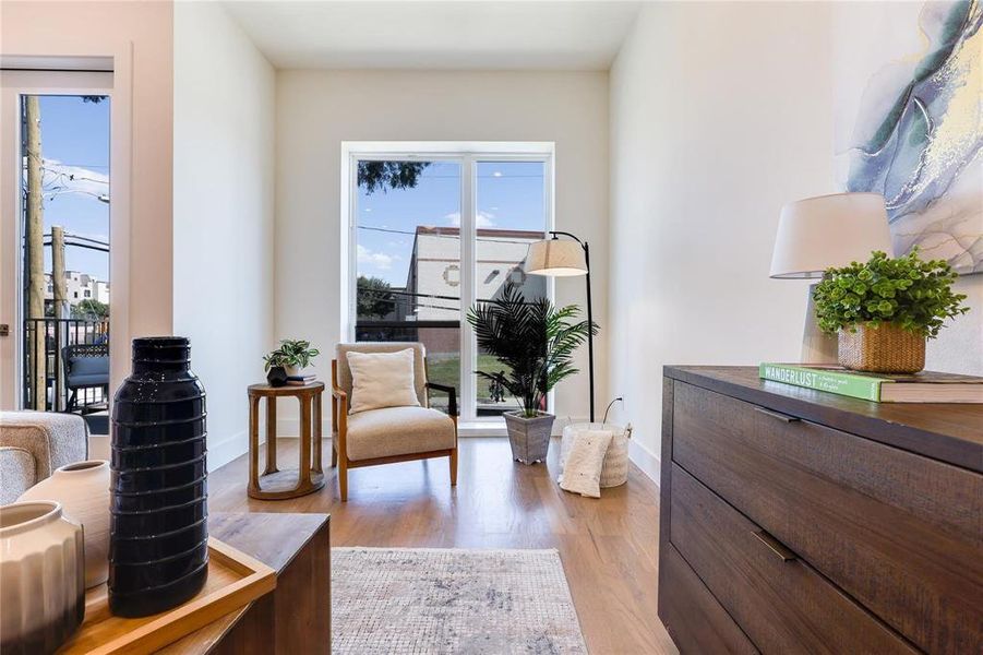 Living area featuring light hardwood / wood-style floors