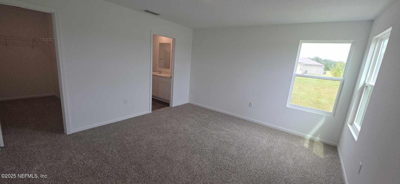 Spacious, unfurnished interior of a new home in The Arbors, Jacksonville (Image 23).