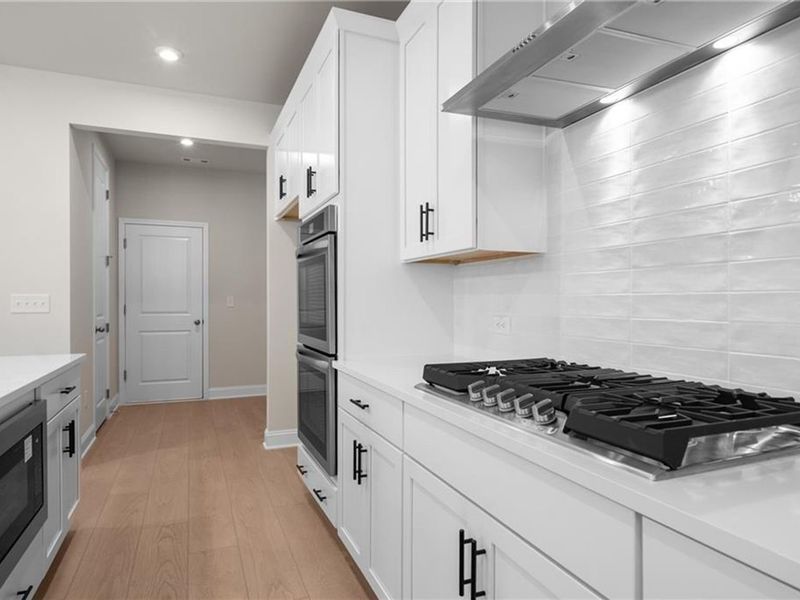 Furnished interior view inside a new home in Melody Lakeside Estates, Buford (Image 5).