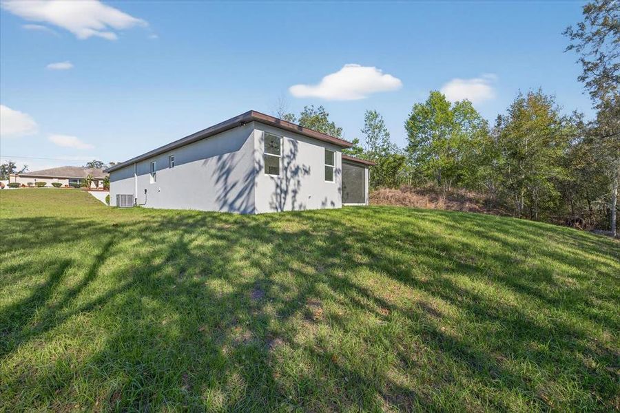 Exterior details and patio area of a home in , Spring Hill (Image 21).