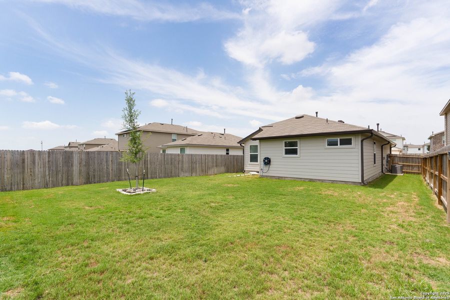 Front exterior of a new home in Whisper Falls, San Antonio, TX, highlighting curb appeal (Image 19). Front exterior of a new home in Whisper Falls, San Antonio, TX, highlighting curb appeal (Image 19).