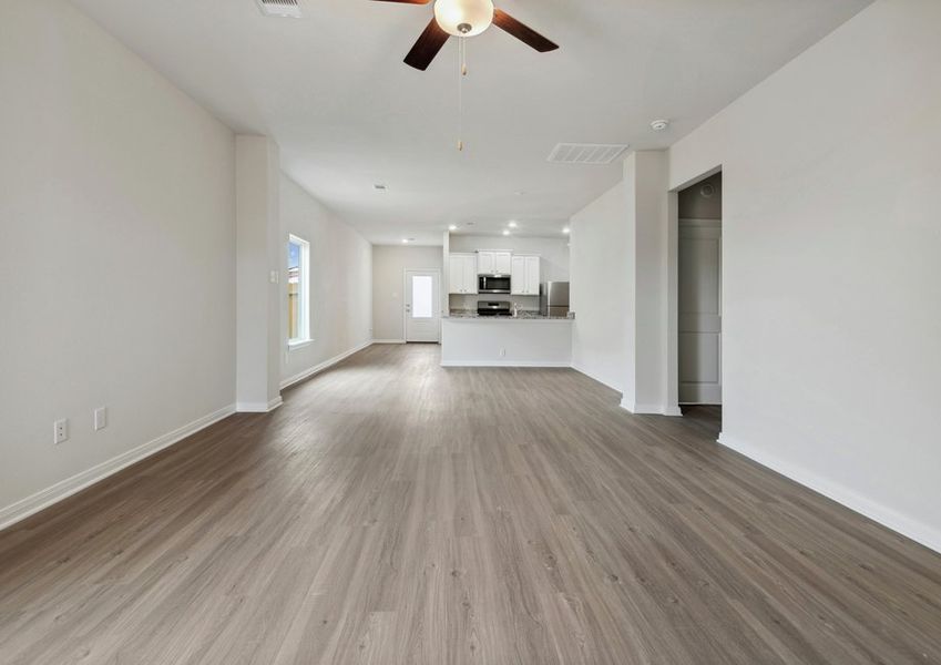 Spacious family room with vinyl flooring Spacious family room with vinyl flooring