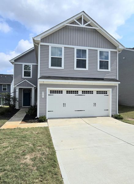 Front exterior of a new home in , Greenville, SC, highlighting curb appeal (Image 2).