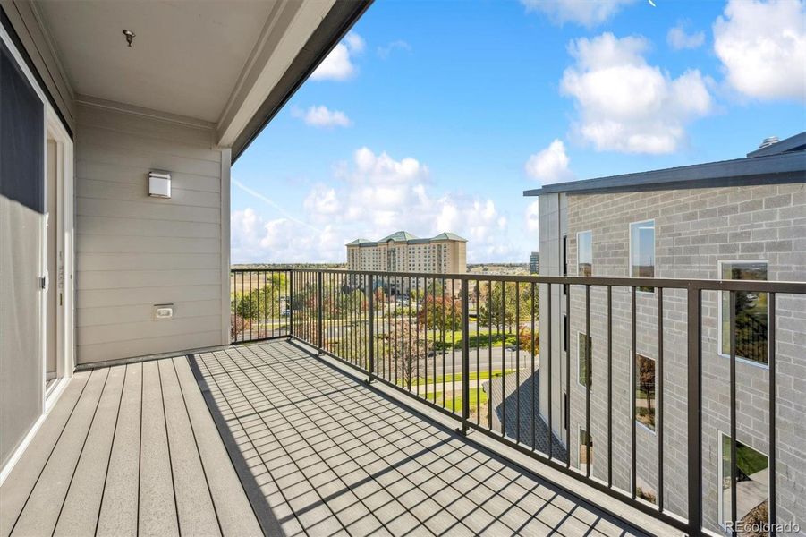 Exterior details and patio area of a home in Condo Collection at Grand Vue at Interlocken, Broomfield (Image 1).