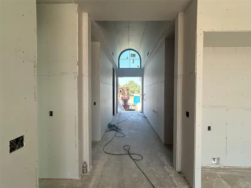Hallway featuring concrete floors Hallway featuring concrete floors