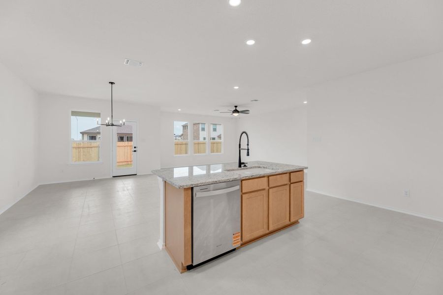 Furnished interior view inside a new home in Mustang Valley, Manor (Image 12).