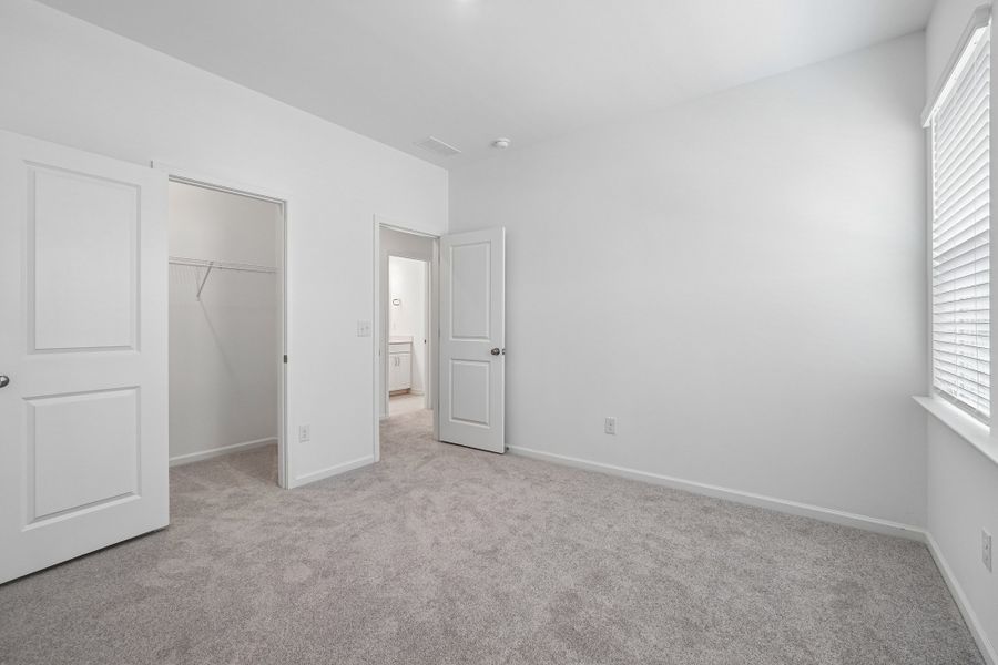 Spacious, unfurnished interior of a new home in Terraces at the Exchange, Indian Land (Image 34).