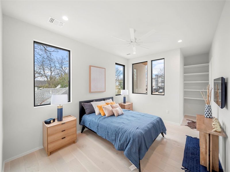 Bedroom with recessed lighting, light wood-style flooring, and ceiling fan