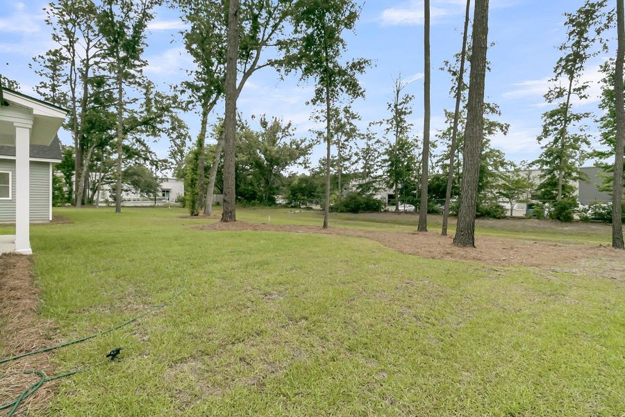 Front exterior of a new home in , Ladson, SC, highlighting curb appeal (Image 23).