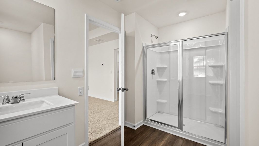 Representative furnished interior of a home built from the Salisbury by D.R. Horton in Inverness at Sugarloaf, Lawrenceville (Image 12).
