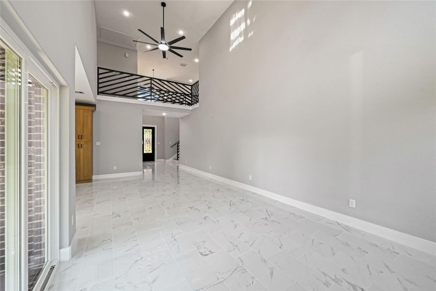 livingroom with two ceiling fans