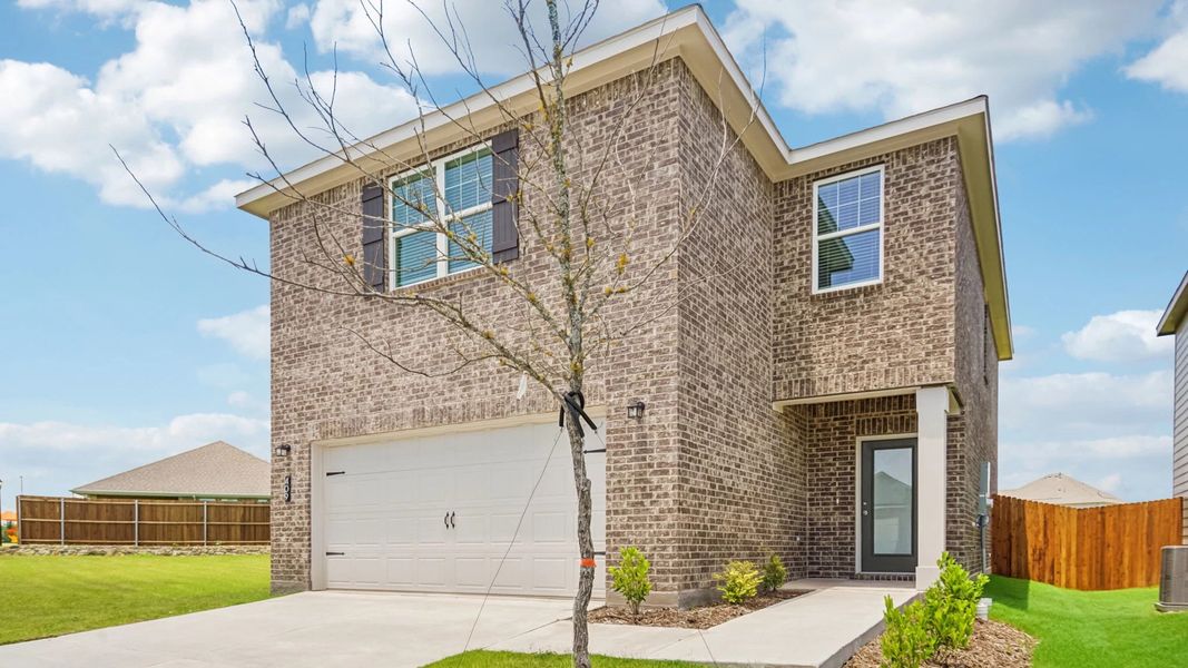 Representative exterior photo of a completed home built from the Discovery by Starlight Homes in Coyote Meadows, Anna, TX (Image 2). Representative exterior photo of a completed home built from the Discovery by Starlight Homes in Coyote Meadows, Anna, TX (Image 2).