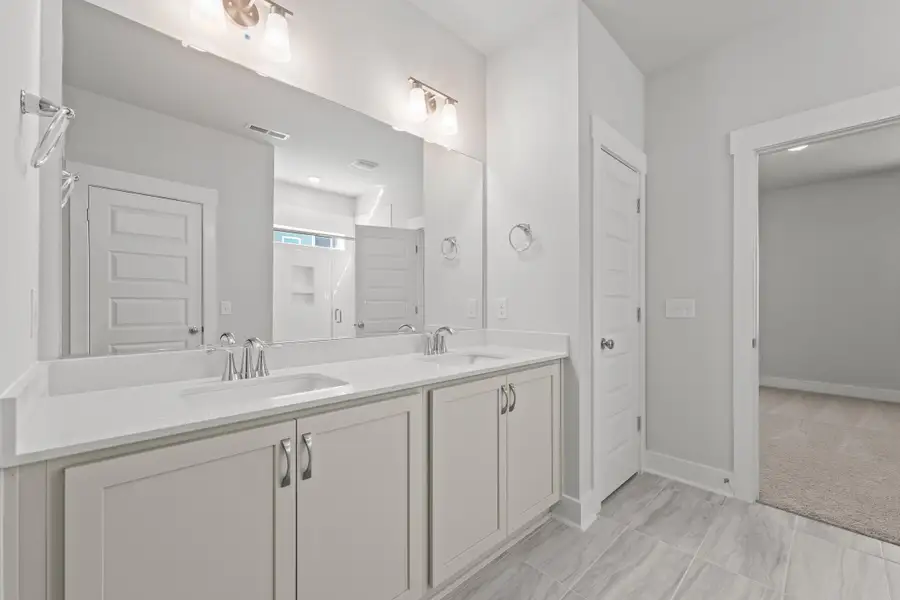 Representative furnished interior of a home built from the Raindrops on Roses by Garman Homes in McConnell Ridge, McLeansville (Image 4).