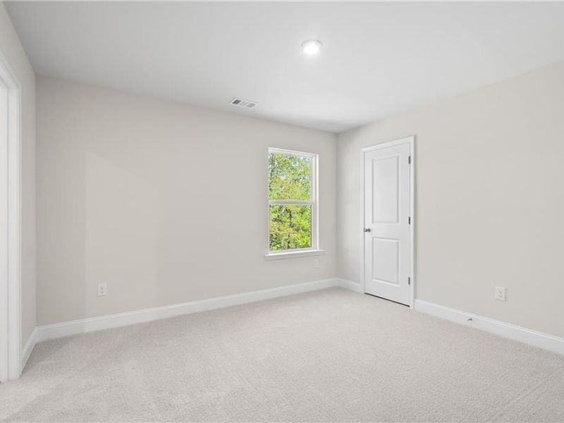 Spacious, unfurnished interior of a new home in Melody Lakeside Estates, Buford (Image 26).