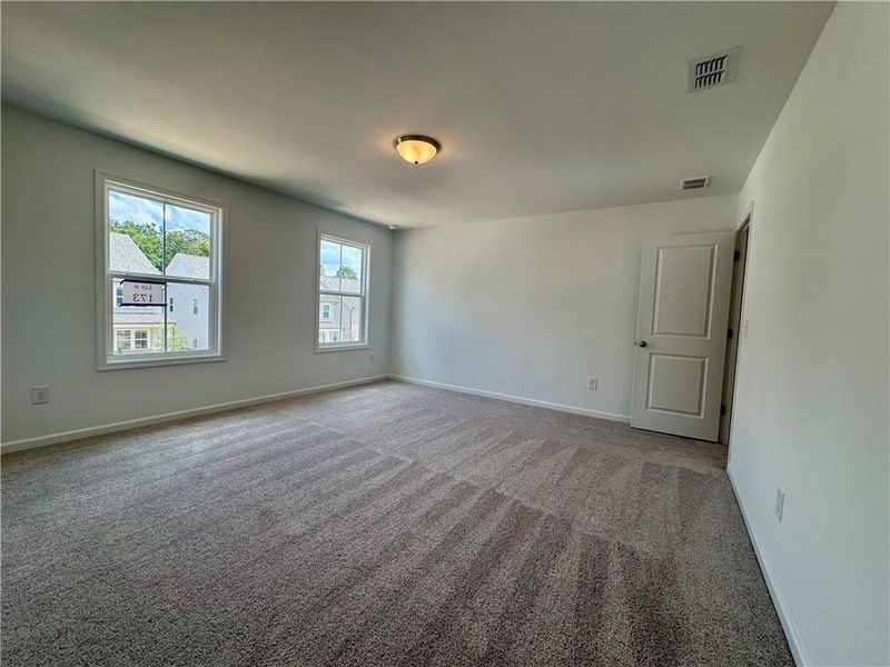 Spacious, unfurnished interior of a new home in Eastlyn Crossing - Single Family, Flowery Branch (Image 28). Spacious, unfurnished interior of a new home in Eastlyn Crossing - Single Family, Flowery Branch (Image 28).