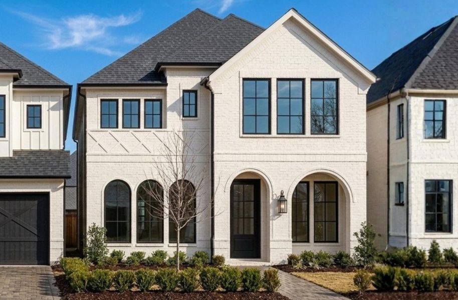 Representative exterior photo of a completed home built from the Royal Bradford by Grand Homes in Trails at Cottonwood Creek, Rowlett, TX (Image 21). Representative exterior photo of a completed home built from the Royal Bradford by Grand Homes in Trails at Cottonwood Creek, Rowlett, TX (Image 21).