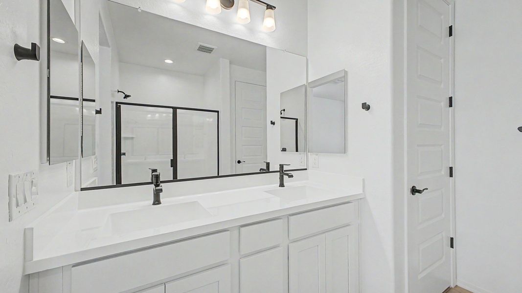 Representative furnished interior of a home built from the Acacia II by DRB Homes in Apache Farms, Buckeye (Image 18).