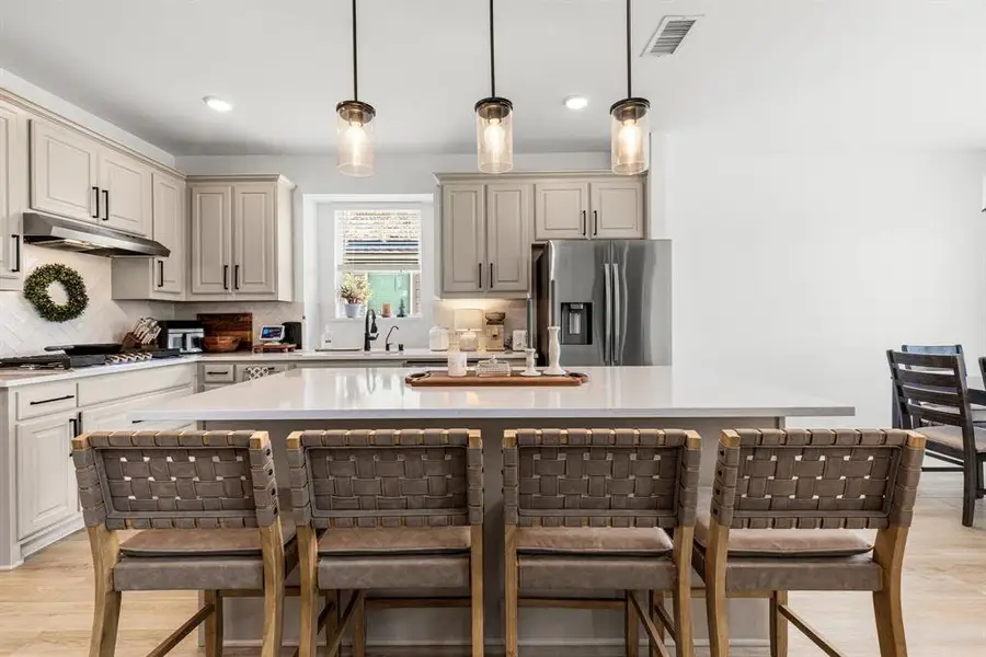 Furnished interior view inside a new home in Grayhawk Addition, Forney (Image 5).