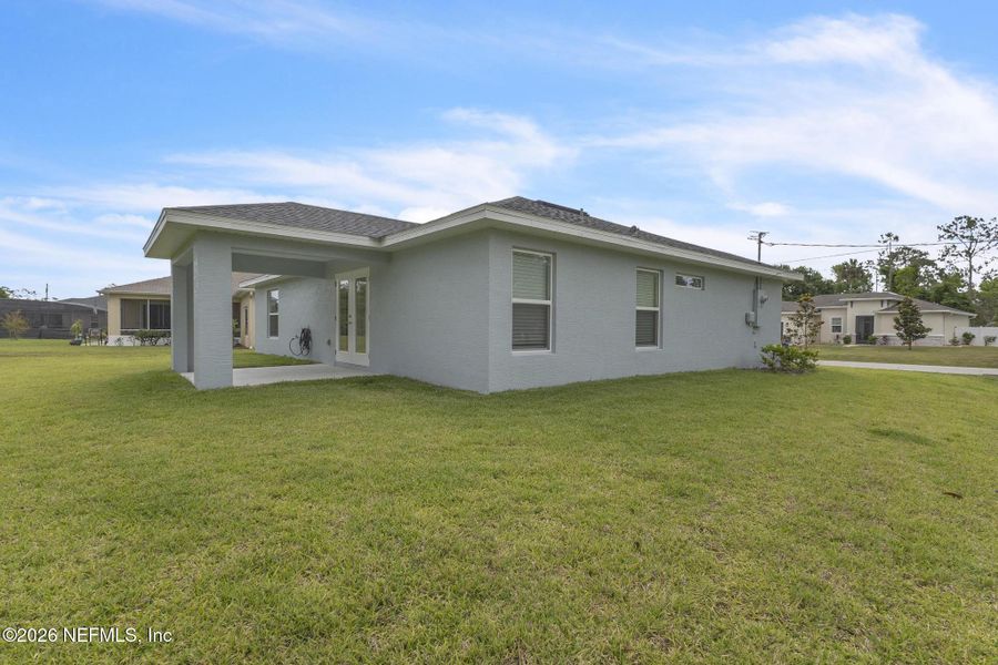 Exterior details and patio area of a home in , Palm Coast (Image 4).