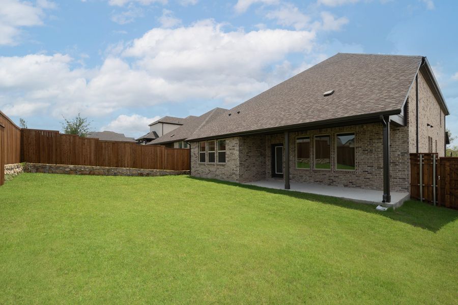 Exterior details and patio area of a home in Enclave at Legacy Hills, Celina (Image 2). Exterior details and patio area of a home in Enclave at Legacy Hills, Celina (Image 2).