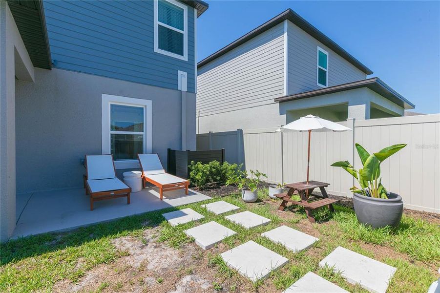 Exterior details and patio area of a home in Angeline, Land O' Lakes (Image 4).