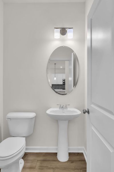 Downstairs powder room perfect for guests. Downstairs powder room perfect for guests.