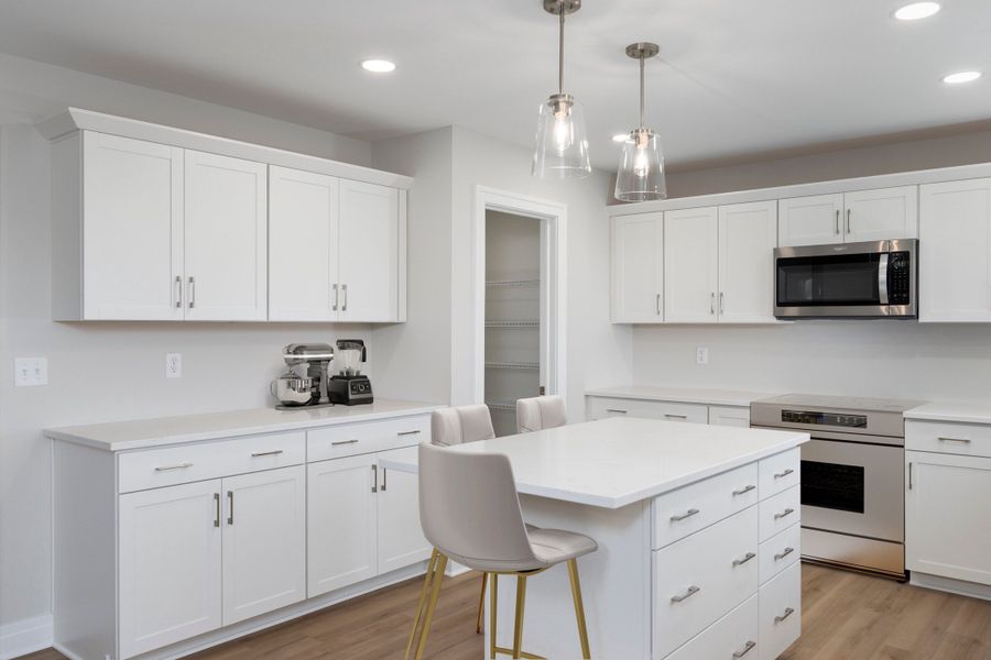 Representative furnished interior of a home built from the The Dorchester by Forbes Capretto Homes in Sandywood Circle, Grand Island (Image 6).