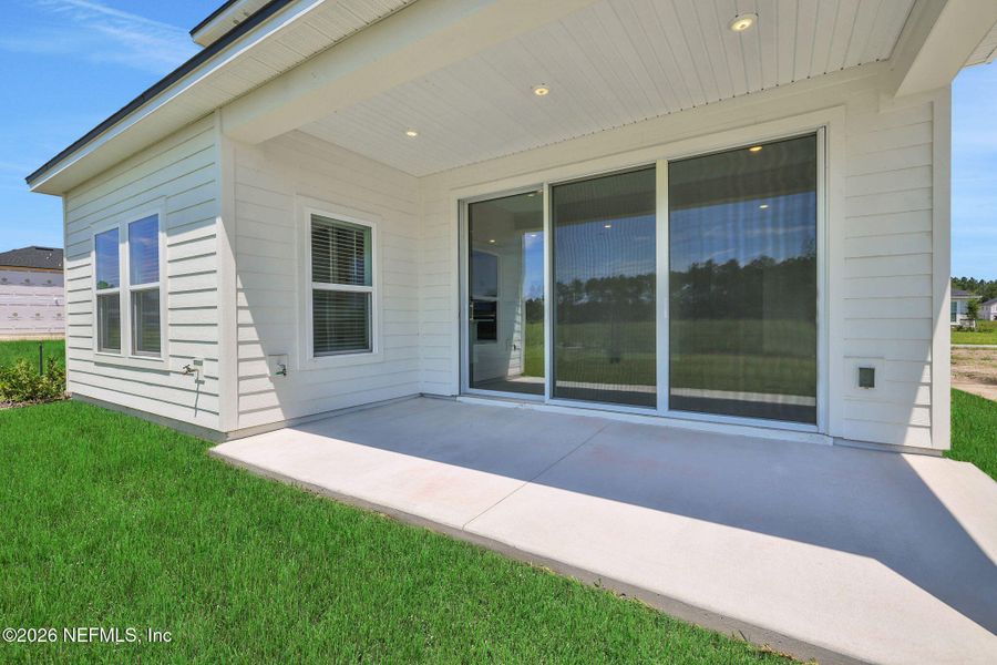 Exterior details and patio area of a home in Brook Forest, St. Augustine (Image 4).