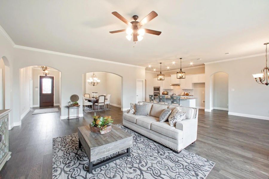 Family Room & Kitchen | Concept 2555 at Massey Meadows in Midlothian, TX by Landsea Homes