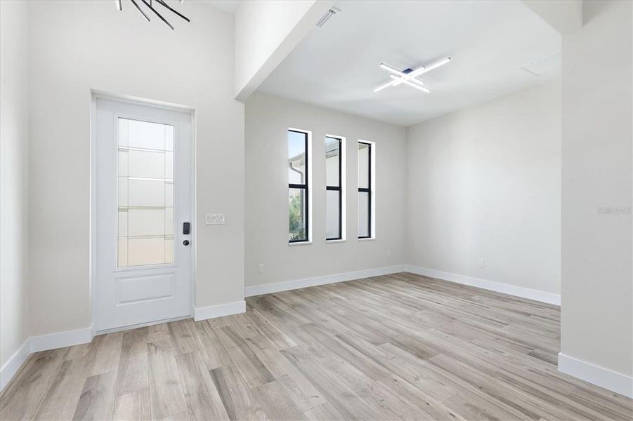 Spacious, unfurnished interior of a new home in , Port Charlotte (Image 20).