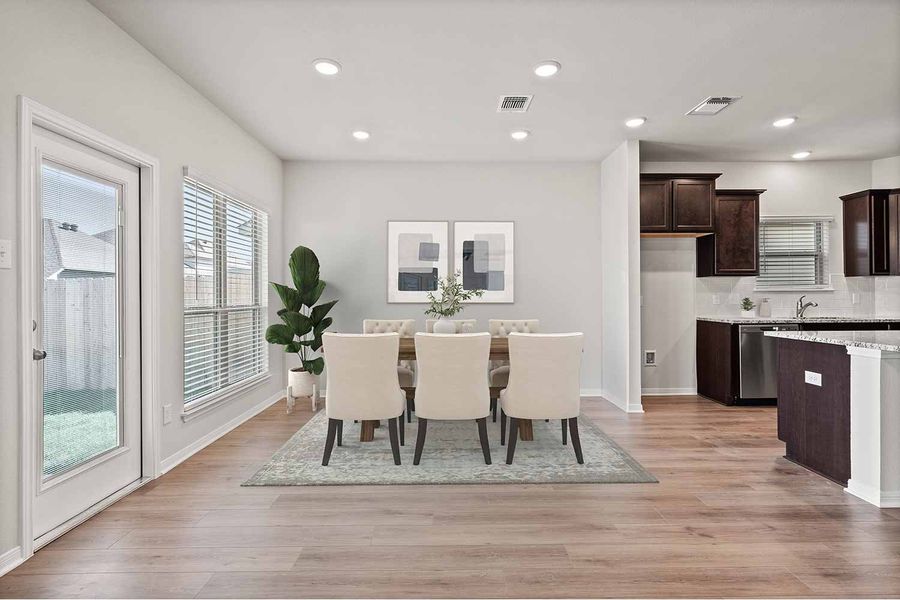 Representative furnished interior of a home built from the Fuller by Omega Builders in Southern Pointe, College Station (Image 6).
