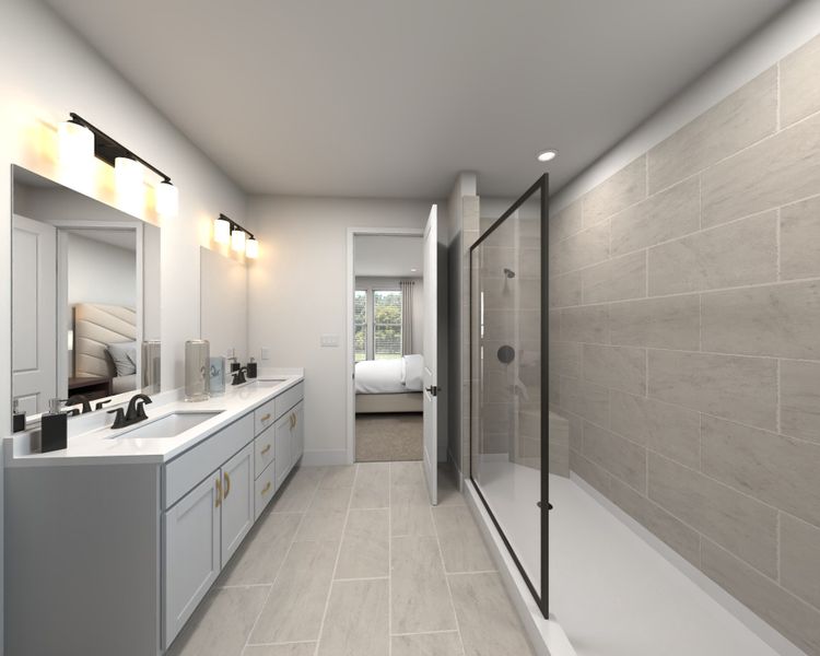 The primary bathroom offers dual vanity sinks and a walk-in shower.