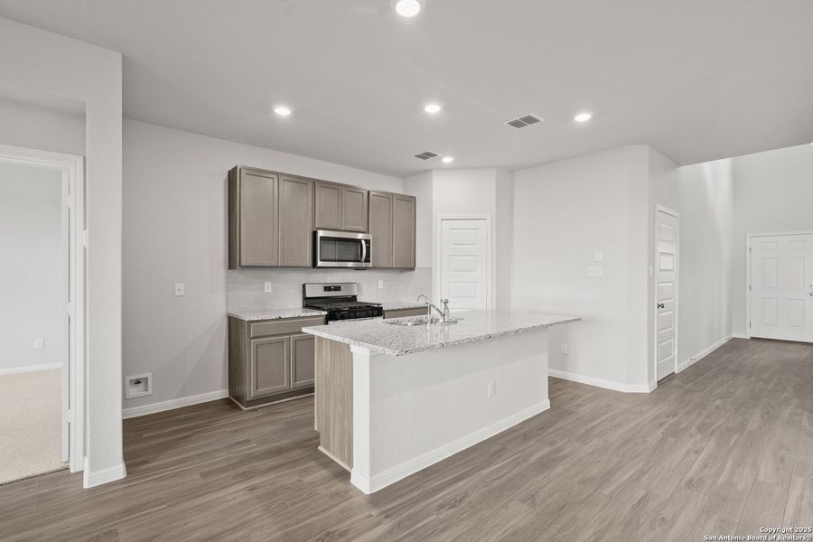 Furnished interior view inside a new home in Timber Creek, San Antonio (Image 8). Furnished interior view inside a new home in Timber Creek, San Antonio (Image 8).