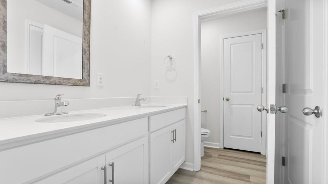 Furnished interior view inside a new home in Village Grove, Greenville (Image 13).