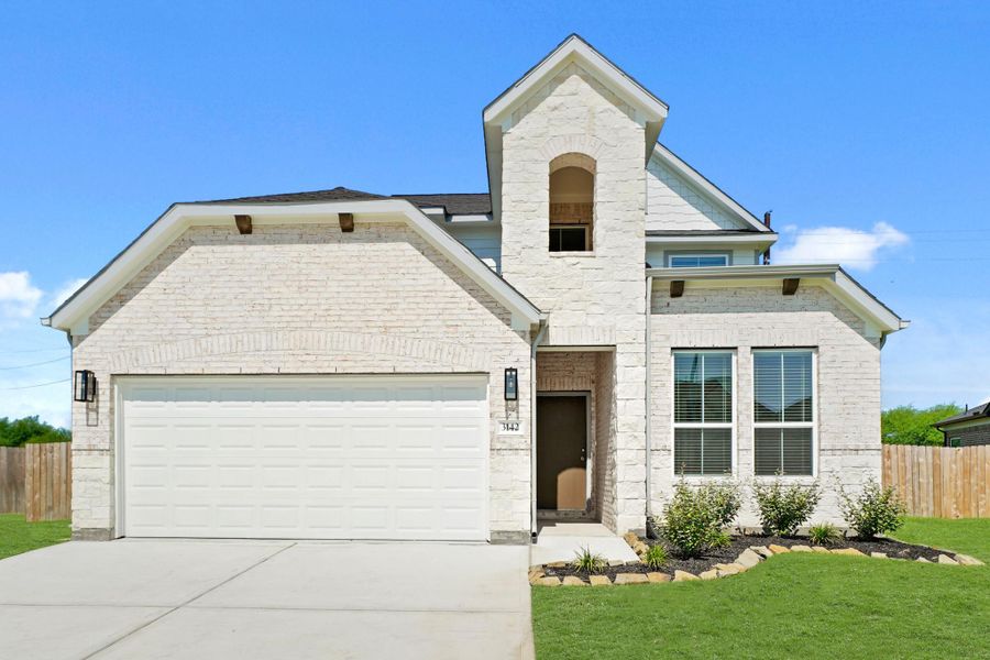 Front exterior of a new home in Briarwood Crossing, Rosenberg, TX, highlighting curb appeal (Image 2). Front exterior of a new home in Briarwood Crossing, Rosenberg, TX, highlighting curb appeal (Image 2).