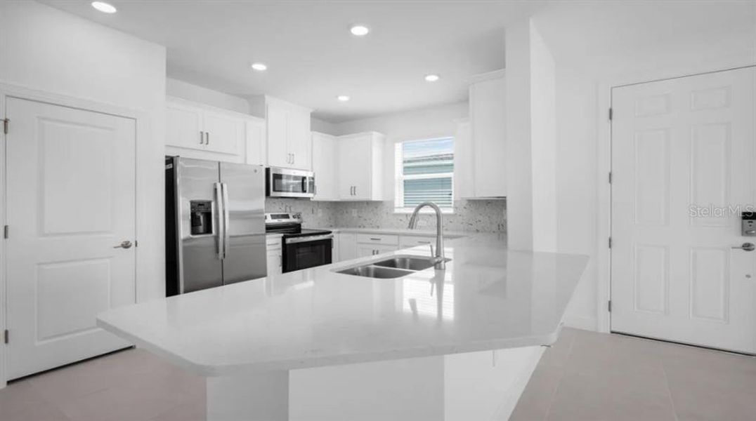 Furnished interior view inside a new home in The Cove at West Port, Port Charlotte (Image 6).