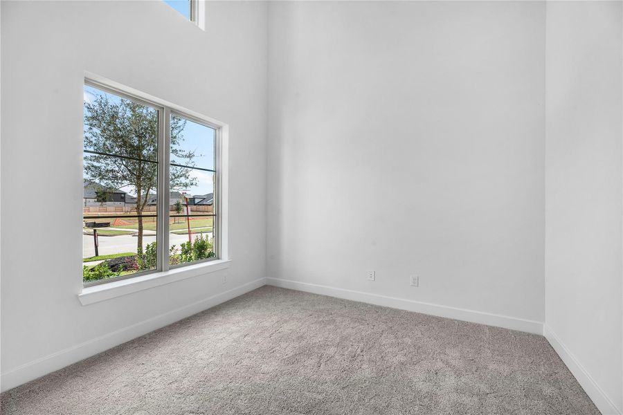 Spacious, unfurnished interior of a new home in Sienna, Missouri City (Image 21).