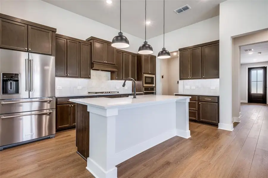 Furnished interior view inside a new home in , Little Elm (Image 6). Furnished interior view inside a new home in , Little Elm (Image 6).