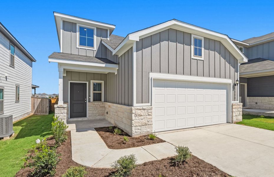 Front exterior of a new home in Sonterra, Jarrell, TX, highlighting curb appeal (Image 22).