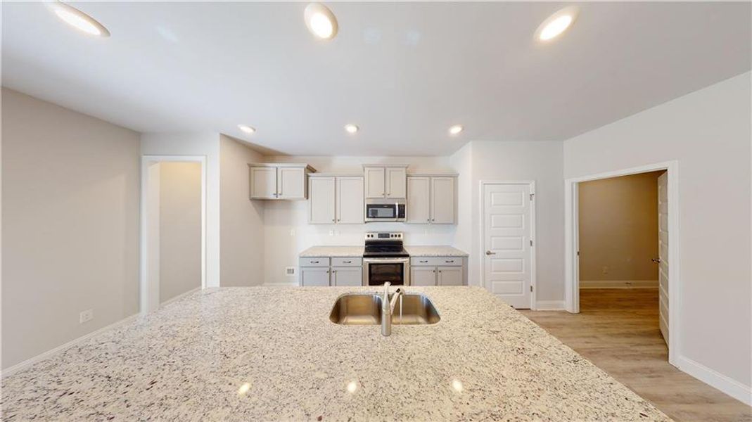 Furnished interior view inside a new home in Holliday Pass, Griffin (Image 4).