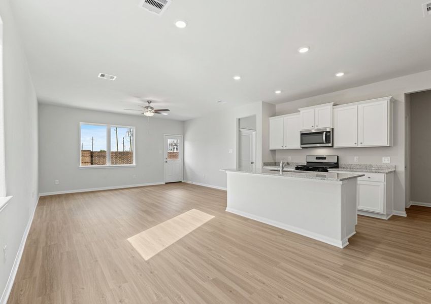 Kitchen and adjoining dining room Kitchen and adjoining dining room