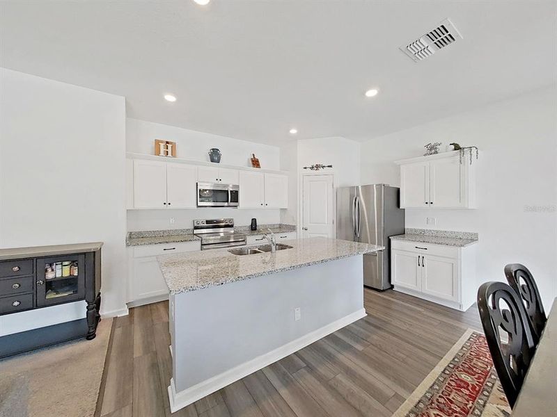 Furnished interior view inside a new home in Clinton Corner, Dade City (Image 7).