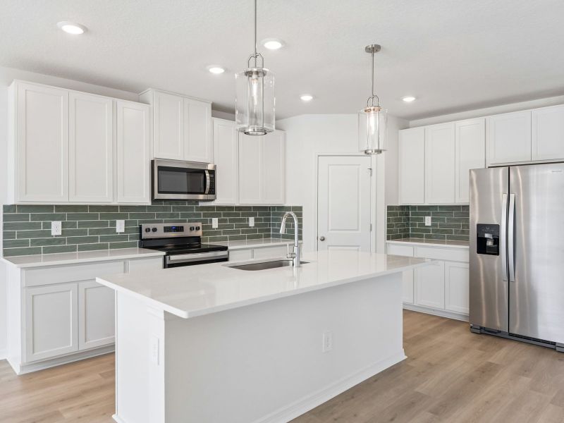 Furnished interior view inside a new home in Pine Ridge Meadows, Hudson (Image 6).