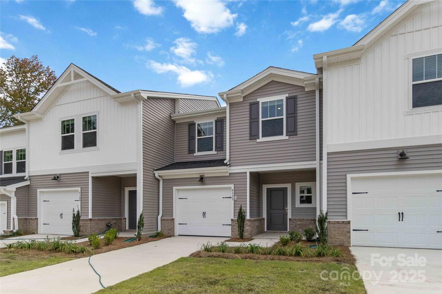 Front exterior of a new home in , Charlotte, NC, highlighting curb appeal (Image 19).