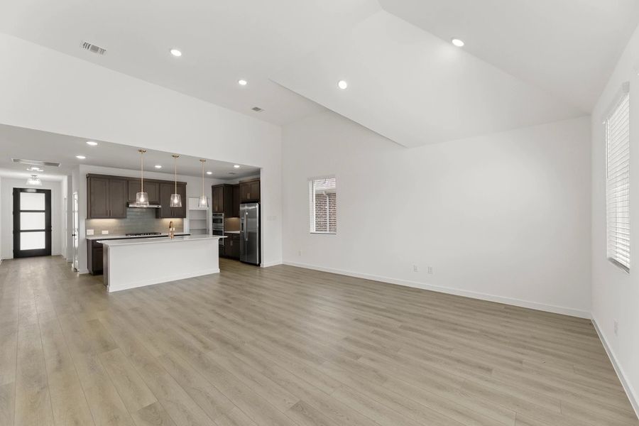 Open Kitchen-Living-Dining Room featuring the Laguna Collection