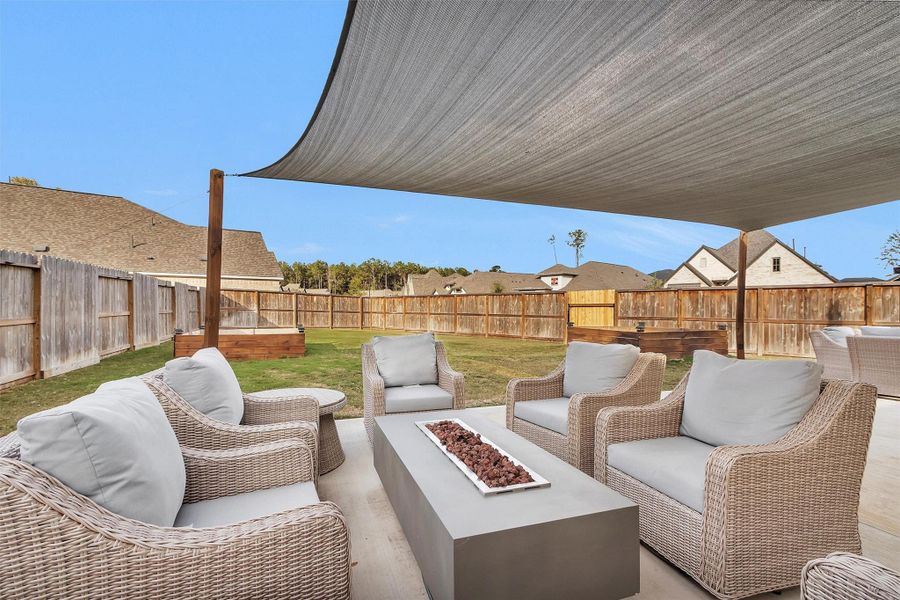 Resort-style back yard with sail-cloth coverings