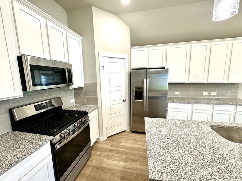 Furnished interior view inside a new home in , Cypress (Image 11).