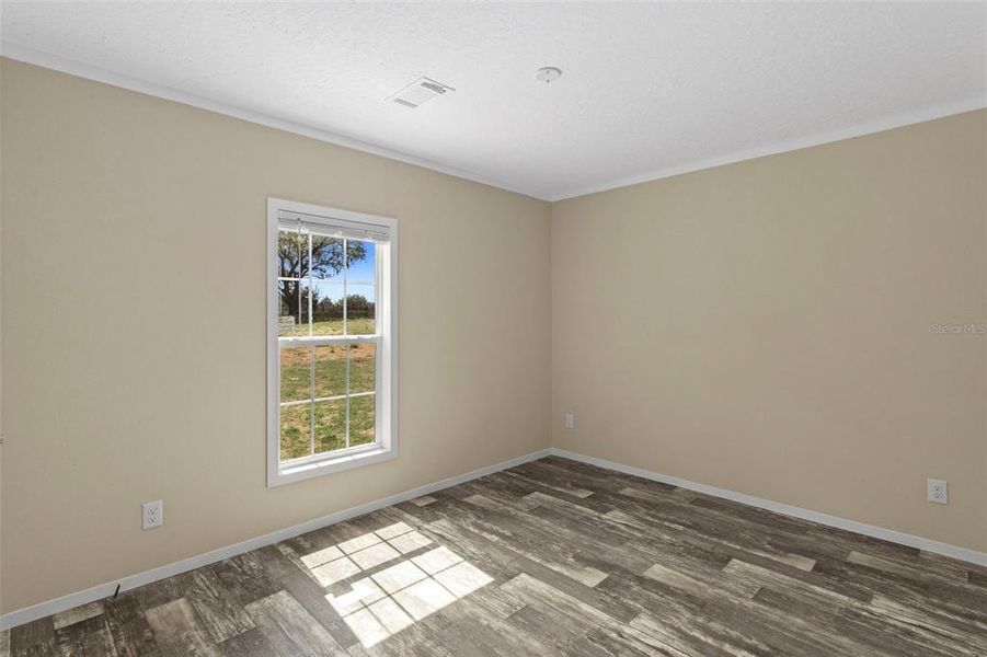 Spacious, unfurnished interior of a new home in , Dade City (Image 39).